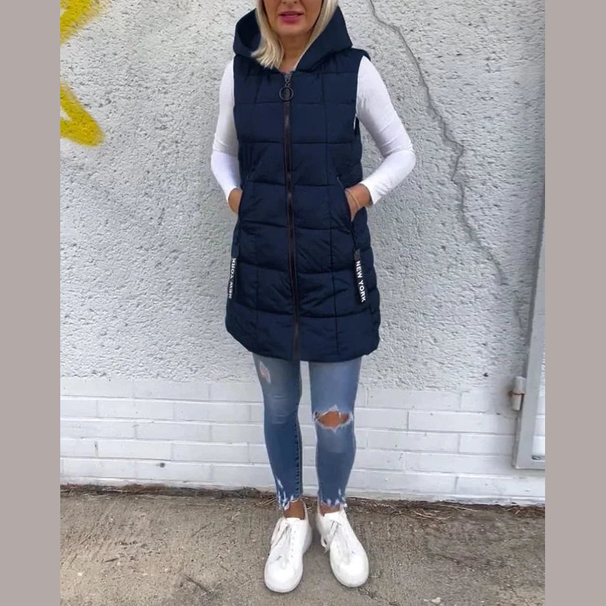 Melina – Ærmeløs polstret frakke med lynlås