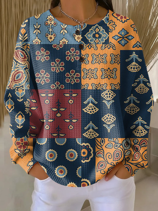 Anika | Sweater med etnisk ternet blomsterprint