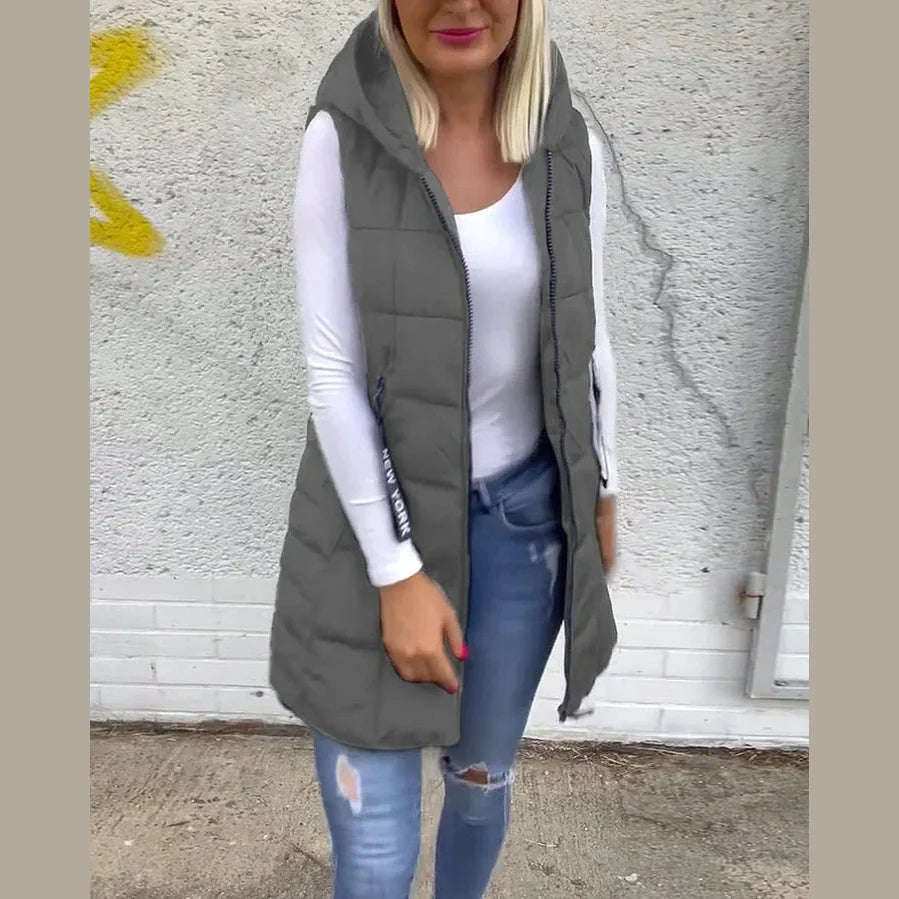 Melina – Ærmeløs polstret frakke med lynlås