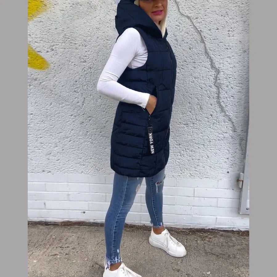 Melina – Ærmeløs polstret frakke med lynlås