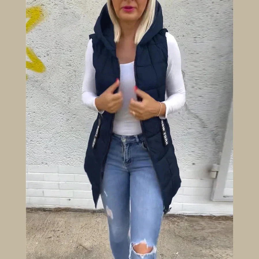 Melina – Ærmeløs polstret frakke med lynlås